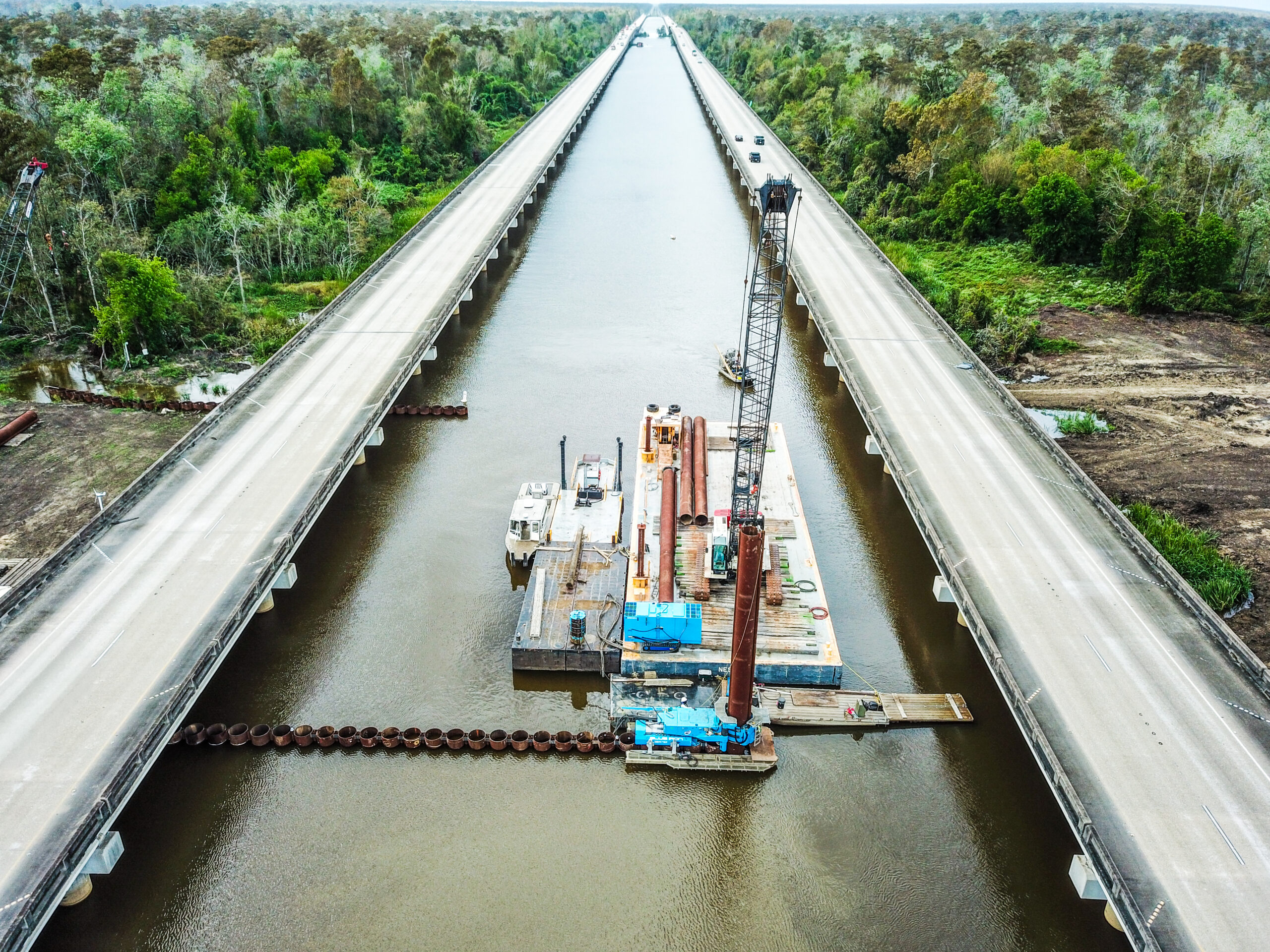 Building water restraining system under interstate bridges